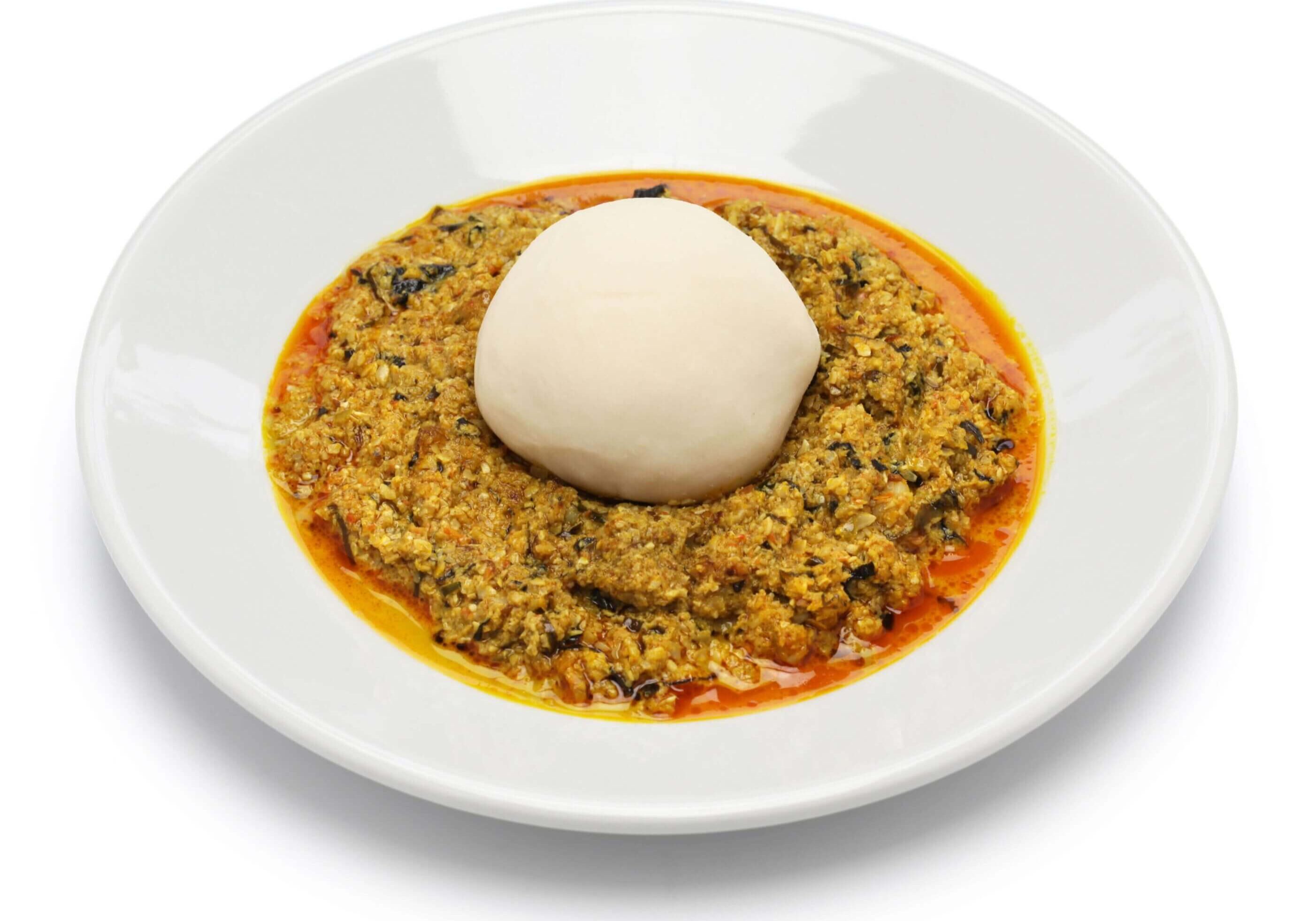 The product “Customizable & Convenient” features a white plate with a round portion of fufu at the center, encircled by a serving of egusi soup in a rich, orange sauce.